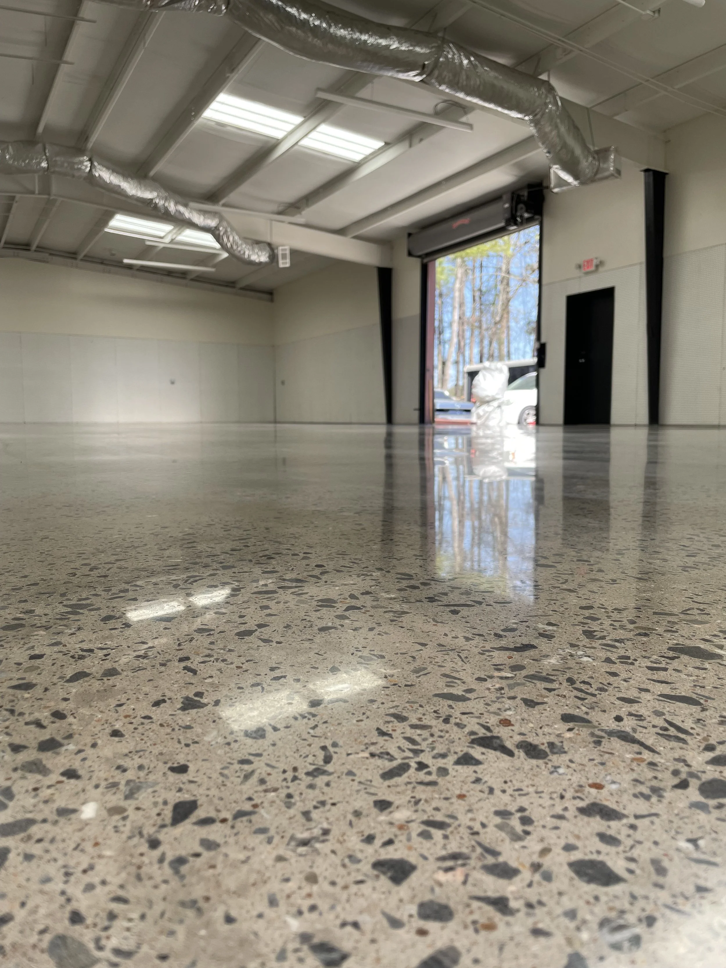 Polished grind and seal floor with exposed aggregate in a commercial space